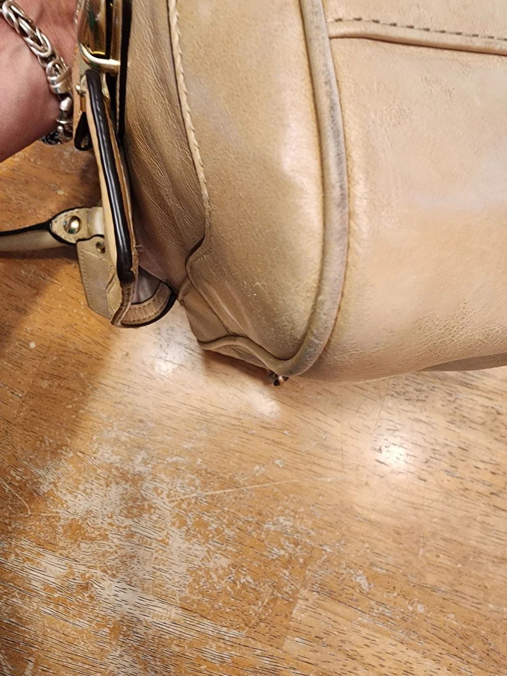 2011 Coach Poppy Push Lock Satchel features a beige leather exterior